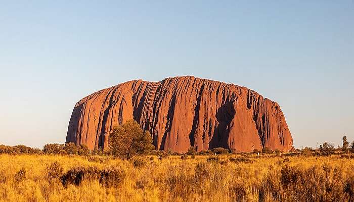 Uluru (Ayers Rock) in Uluṟu-Kata Tjuṯa National Park at sunset, Petermann Ranges, Northern Territory, Australia