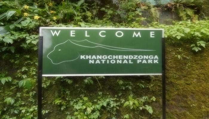 A board showing the name of the Khangchendzonga National Park in Yuksom Sikkim