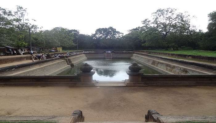 the wide-angle view of the ancient Kuttam Pokuna 