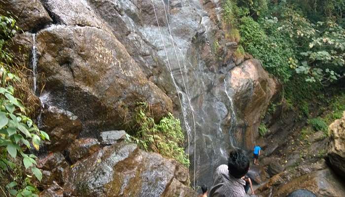 Unwind in the natural pool of Katiki Waterfalls!