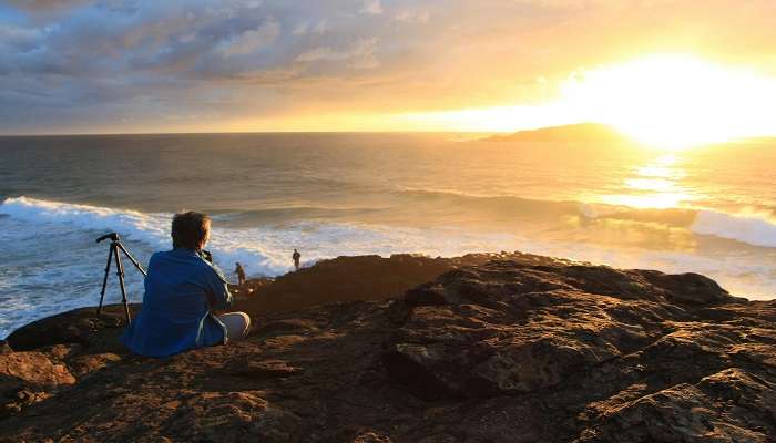 Enjoy a sun-kissed escape at Azheekal Beach - find your perfect spot.