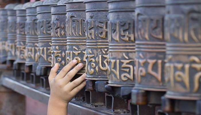 Spin the prayer wheels at Kyichu Lhakhang. 