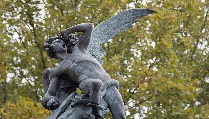 The Fallen Angel Statue in El Retiro Park, Madrid.