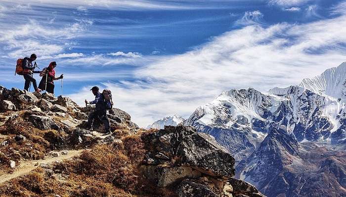 Trekkers trekking towards the peak