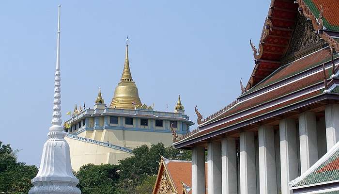 Wat Saket in Bangkok with its iconic golden chedi and surrounding lush greenery