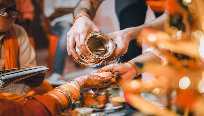 Priests performing sacred rituals.