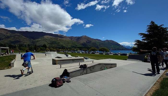 A man skating in the Wänaka skate park.