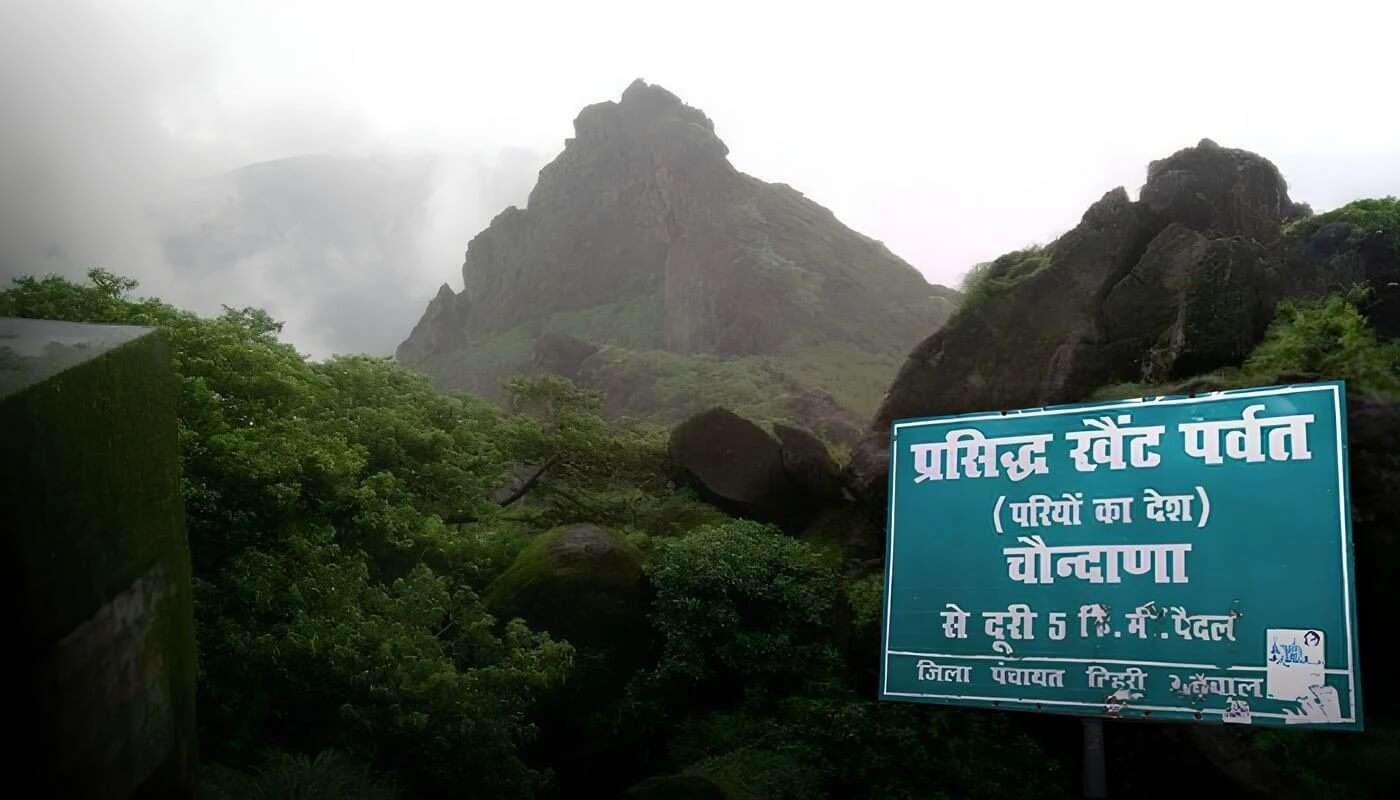 Khait Parvat in Uttarakhand surrounded by dense forest, with a mysterious atmosphere and sacred temple at the hilltop