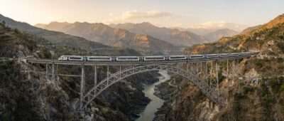 Vande Bharat train crossing the Chenab Rail Bridge high above the river gorge on the Delhi to Kashmir rail route, Reasi