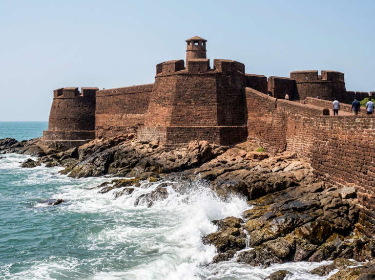 The massive keyhole-shaped laterite walls and circular observation tower in Kasaragod, Kerala, Bekal Fort, India