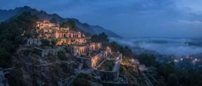 Pari Mahal terraces above misty Dal Lake at dusk, one of the haunted places in Kashmir, Srinagar