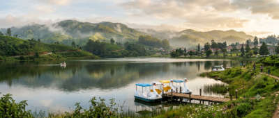 Gregory Lake ringed by the misty hills of Nuwara Eliya, Sri Lanka
