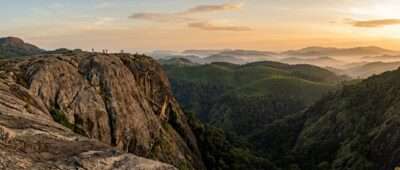 Parunthumpara Eagle Rock viewpoint over misty tea hills and Sabarimala forests in Peermade, Kerala