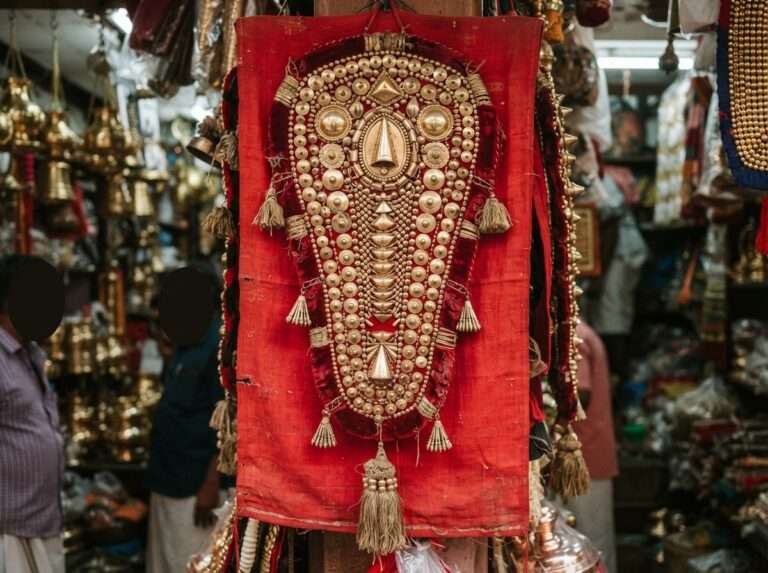 Gold-plated Nettipattam elephant caparison in a Thrissur shop, Kerala
